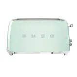 A light green Smeg toaster with a retro design, featuring two slots and a lever on the side for operation.