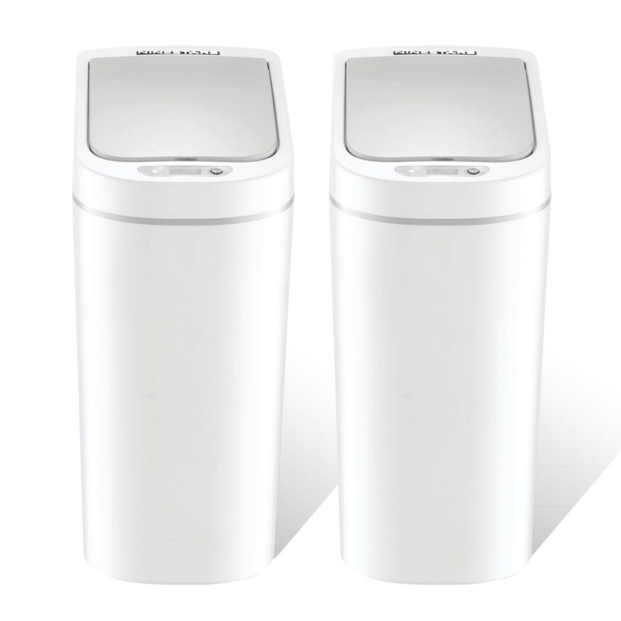 Two sleek white trash bins with touchless lids stand side by side, featuring a modern design with sensor technology for hands-free operation.