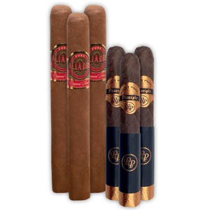 Five cigars, with two brands visible: \“Cuba Aliados\“ with a light brown wrapper and red and gold bands, and \“Rocky Patel Disciple\“ with a dark brown wrapper and copper and black bands.