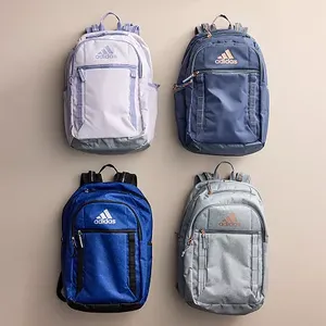 Four Adidas Excel 7 Backpacks are displayed in different colors: lavender, navy, royal blue, and gray, each featuring multiple pockets and the Adidas logo.