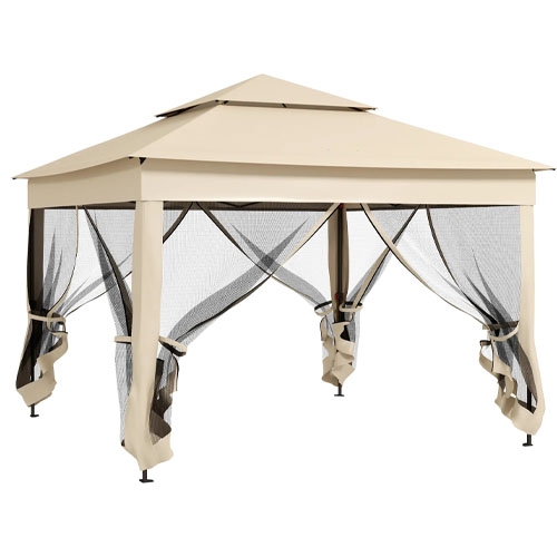 A beige outdoor gazebo with a double-tiered roof and black mesh side curtains.