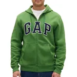 Green zip-up hoodie with \“GAP\“ logo on the front, worn over a white shirt.