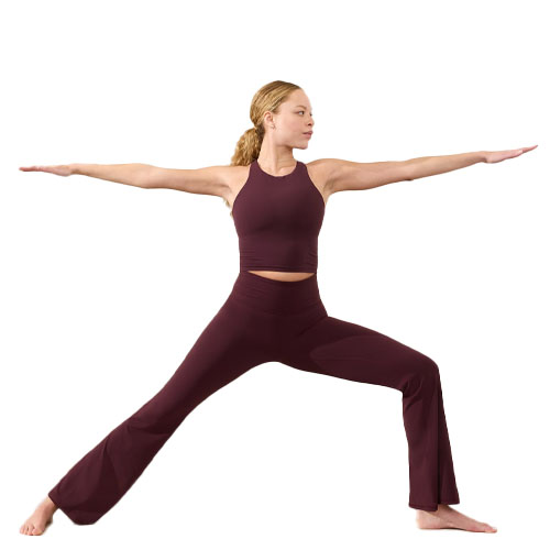 The Elation High Rise Flare Pants are dark burgundy yoga pants featuring a high waist and a flared leg design. The pants provide a snug fit around the waist while allowing movement through the legs, ideal for yoga or casual wear.