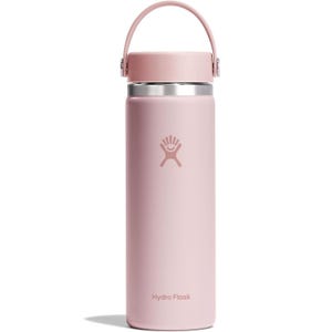 A pink Hydro Flask water bottle with a carrying handle, featuring the Hydro Flask logo on the front.