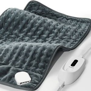 A gray heating pad with a textured surface and an attached white controller featuring multiple heat settings.