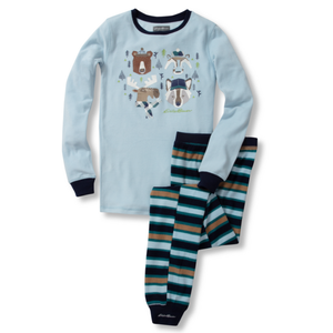 A light blue long-sleeve pajama top with playful animal graphics, paired with striped fleece pants in shades of blue, teal, and brown, featuring contrasting dark cuffs.