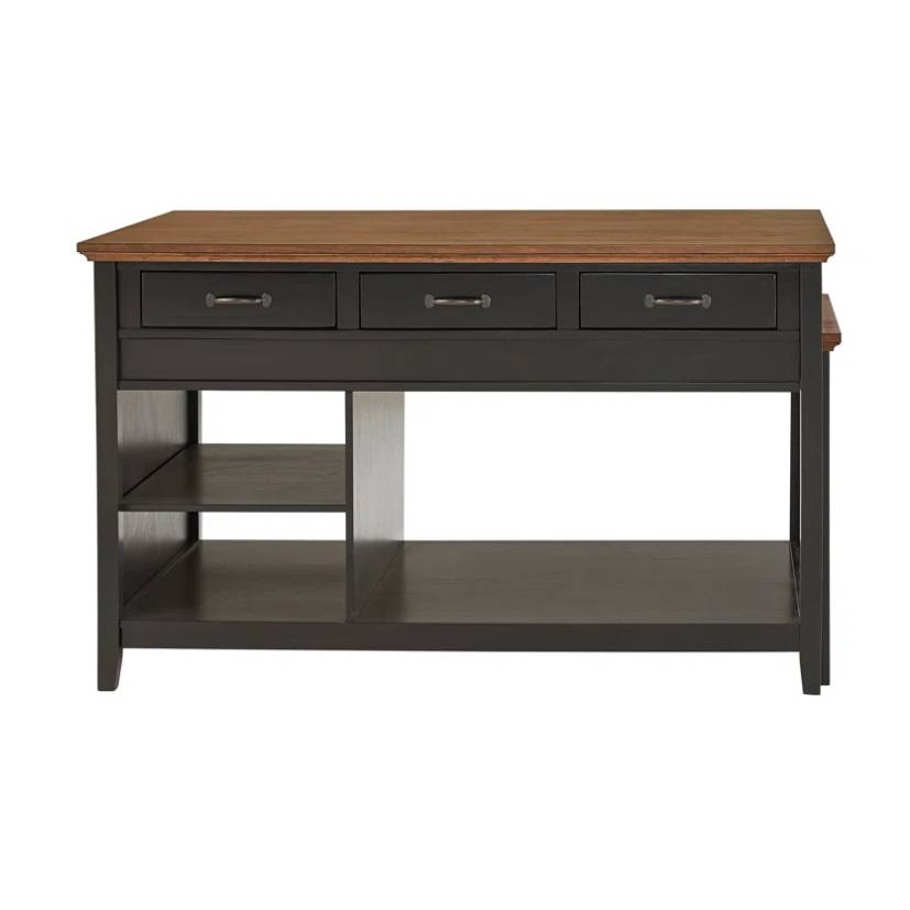 The Kingston Home Spadina Kitchen Island features a dark base with a contrasting wood top. It includes three drawers for storage and open shelving on one side for additional organization.
