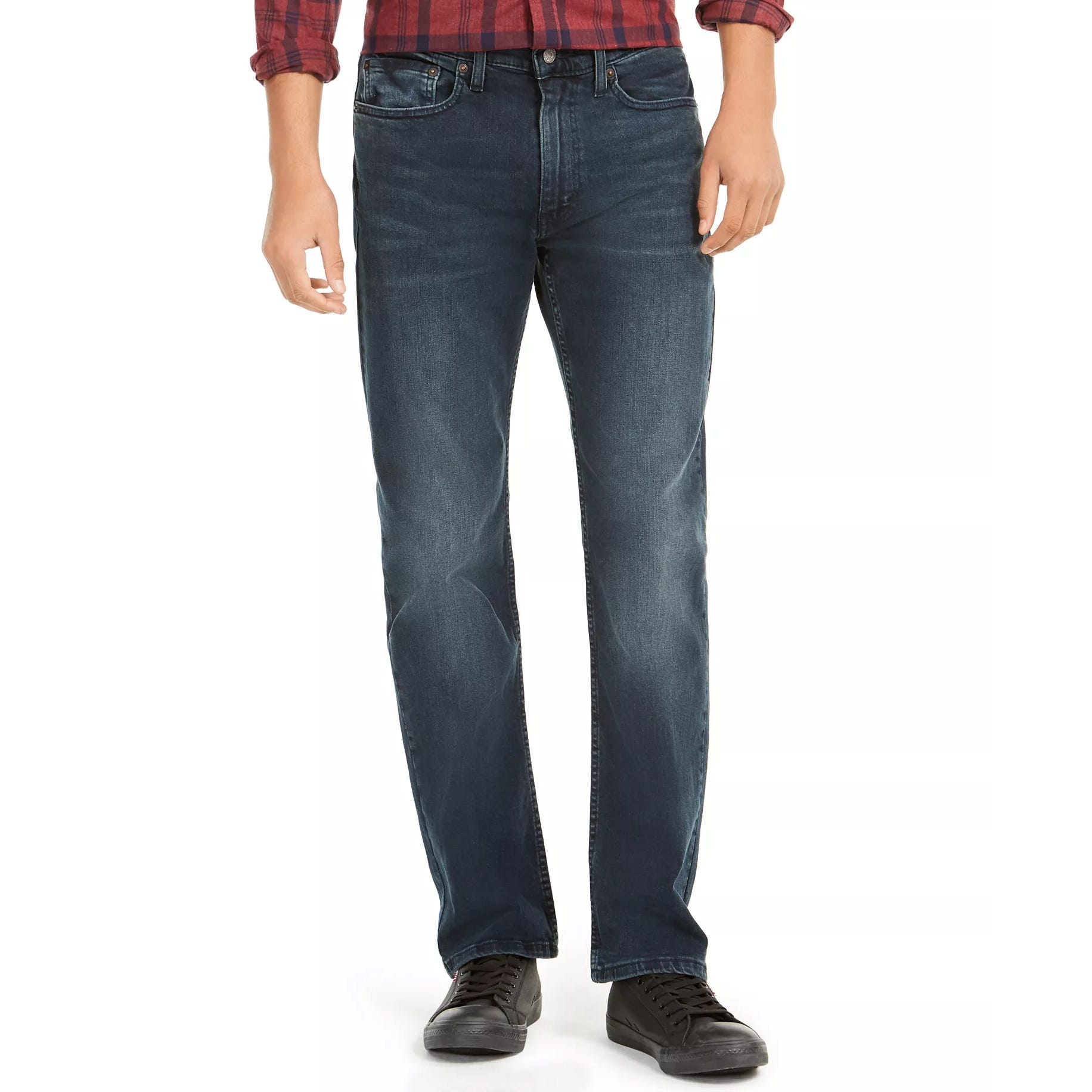 Blue straight-leg jeans with a faded wash, paired with a red plaid shirt and black shoes.