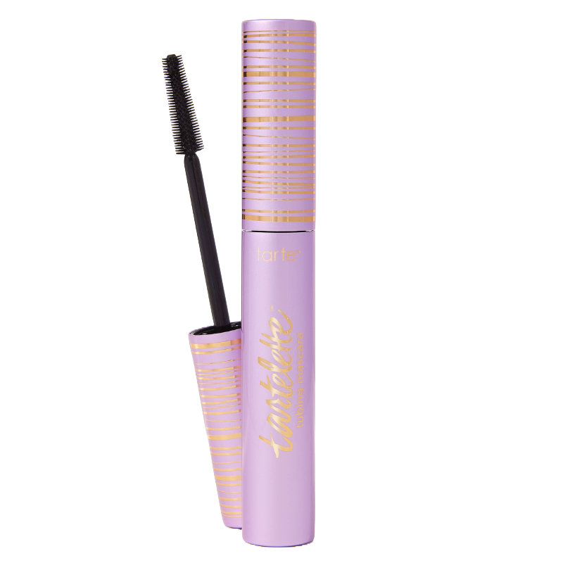 Tartelette Tubing Mascara features a pastel lavender tube with gold stripes and branding. It has a black brush applicator designed for lash volume and length.