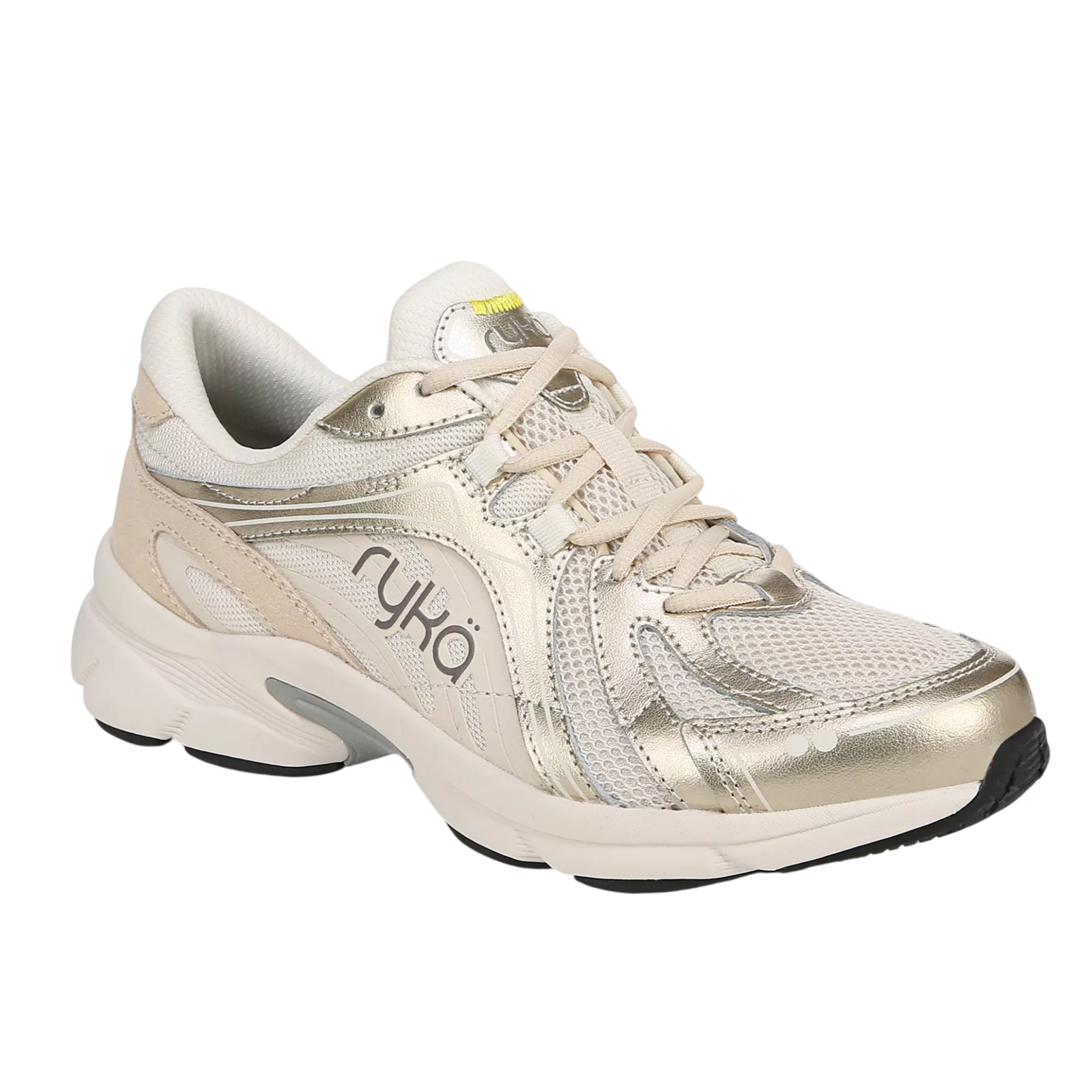 A beige and gold Ryka walking shoe with mesh and metallic accents, featuring a cushioned sole and lace-up design.