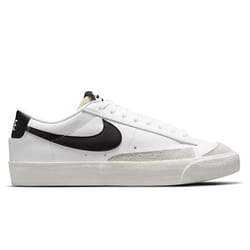 The Nike Blazer '77 Low Shoes are white with a black swoosh, featuring a low-top design, lace-up closure, and a rubber sole with textured details on the side.
