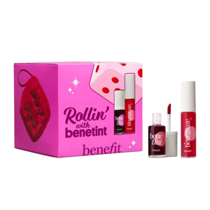 Benefit Cosmetics \“Rollin' with Benetint\“ set includes a Benetint lip and cheek tint and a lip glaze, featuring a pink box with dice and berry imagery.