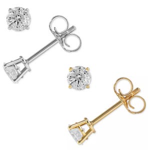 A pair of 1/4ct diamond stud earrings available in two settings: one with a silver-tone finish and the other with a gold-tone finish.