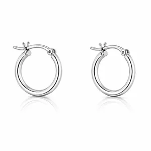 A pair of small silver hoop earrings with a hinge clasp design suitable for piercings.