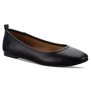 A pair of black leather ballet flats with a small bow detail on the heel.