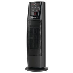 A Lasko oscillating ceramic tower heater with digital controls, adjustable thermostat, and timer, displaying the temperature of 72 degrees.