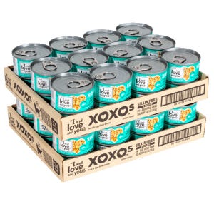 A 48-pack of I and Love and You branded grain-free wet cat food in turquoise and orange cans, stacked in three layers on cardboard trays.