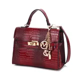 A red crocodile-pattern leather handbag with a top handle and shoulder strap, featuring gold-tone hardware and decorative charms.