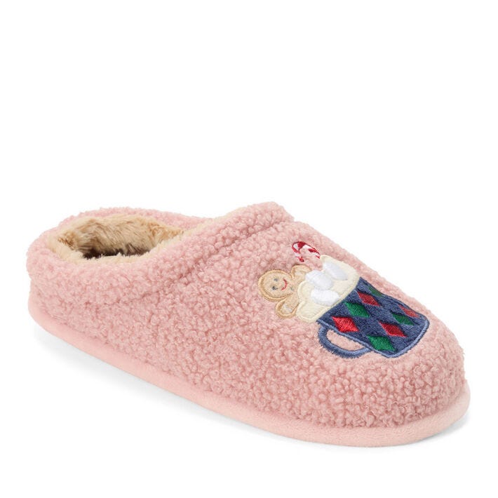 A pink slipper with a cozy, textured exterior featuring an embroidered design of a mug filled with marshmallows, a candy cane, and a gingerbread man.