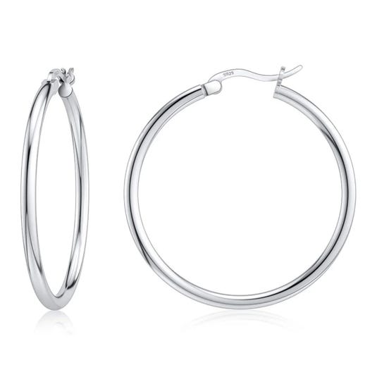 Silver hoop earrings with a latch back design, marked with \“925\“ indicating sterling silver.
