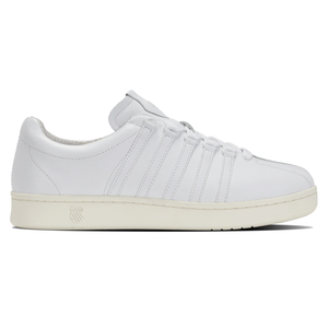 White sneaker with leather upper, featuring five side stripes and a logo on the midsole.