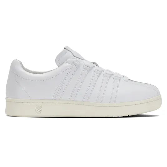 White sneaker with leather upper, featuring five side stripes and a logo on the midsole.