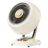 A vintage-style cream tabletop fan with a round body, metal grille, and adjustable base designed for whole-room air circulation.