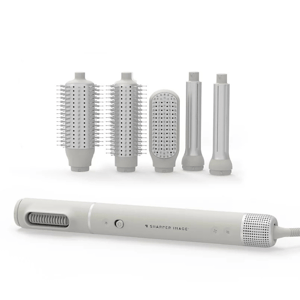 A multi-functional hair styling device with interchangeable attachments, including a flat iron, round brush heads of different sizes, and a pre-styling dryer comb.