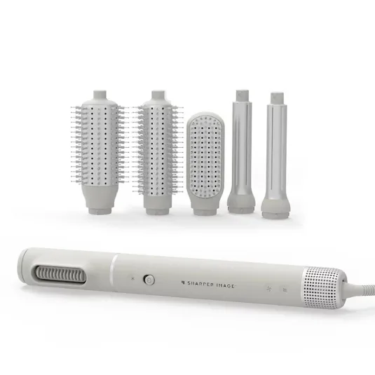 A multi-functional hair styling device with interchangeable attachments, including a flat iron, round brush heads of different sizes, and a pre-styling dryer comb.