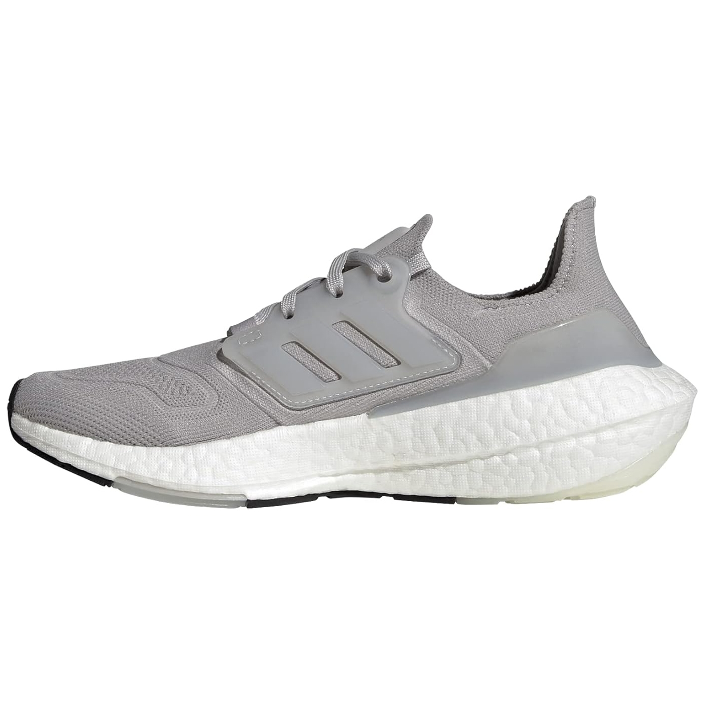 Adidas Ultraboost 22 Running Shoes in light gray feature a breathable mesh upper, distinctive three-stripe side cage, and a plush white Boost midsole for cushioning. They offer a sleek, sock-like fit for comfort and support.