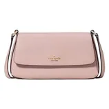 A pink, pebble-leather crossbody bag with a front flap and a strap, featuring the \“kate spade new york\“ logo in gold lettering.