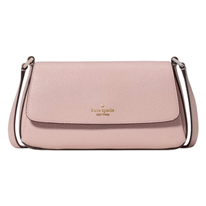 A pink, pebble-leather crossbody bag with a front flap and a strap, featuring the \“kate spade new york\“ logo in gold lettering.