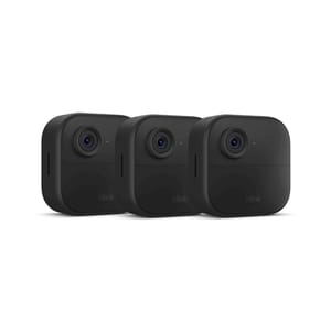Three black Blink security cameras are shown, designed for home surveillance.