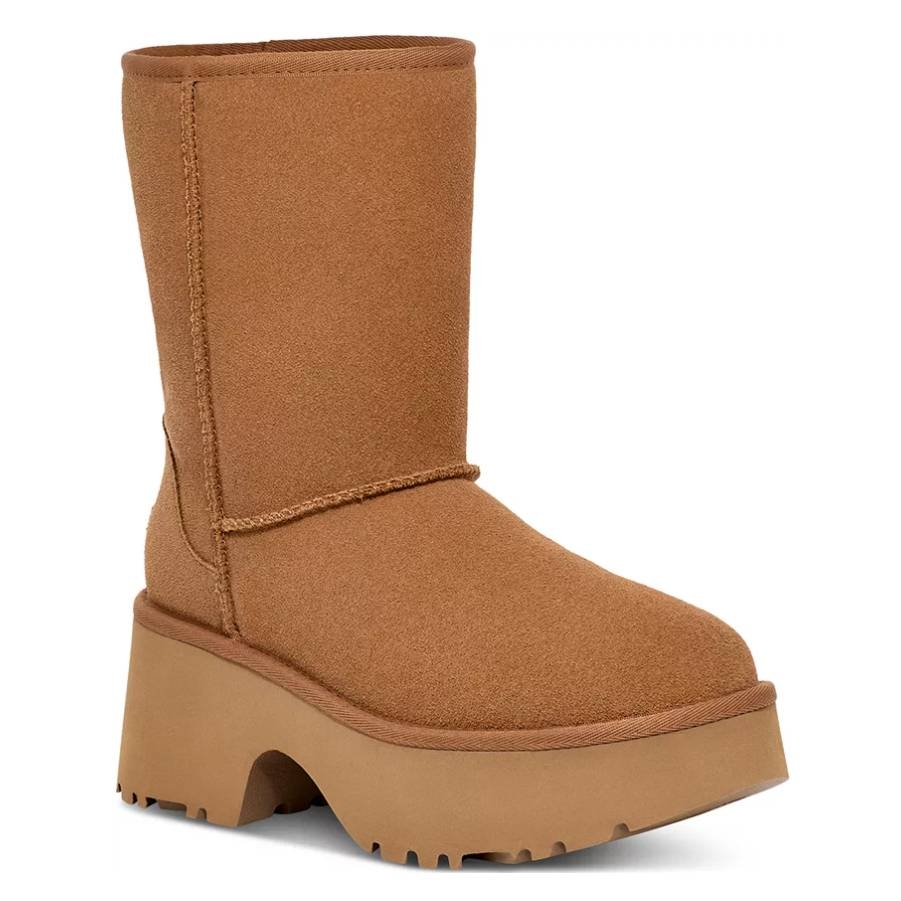 Brown Ugg Classic Boot with a high platform sole and chunky heel, featuring a mid-calf height and soft, suede material.