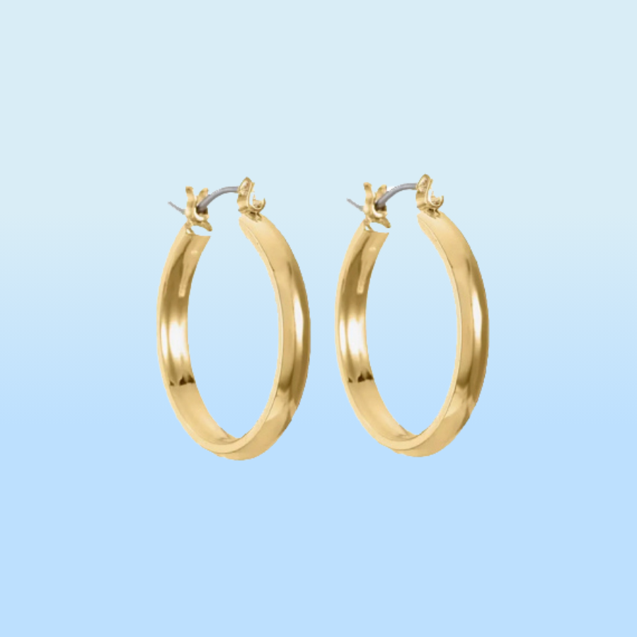 A pair of gold hoop earrings with a polished finish on a light blue background.