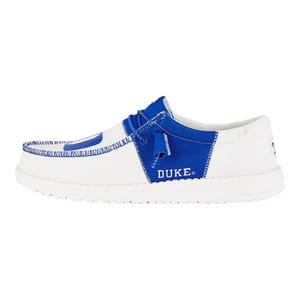A white and blue casual shoe with \“DUKE\“ branding on the side, featuring a slip-on design with laced detailing and a comfortable rubber sole.