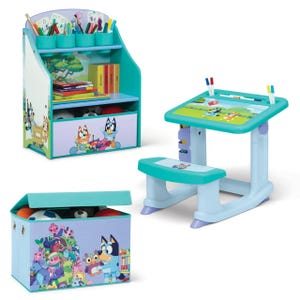 A children's furniture set including a bookshelf with bins, a desk with a chair, and a toy box, all decorated with colorful cartoon characters.
