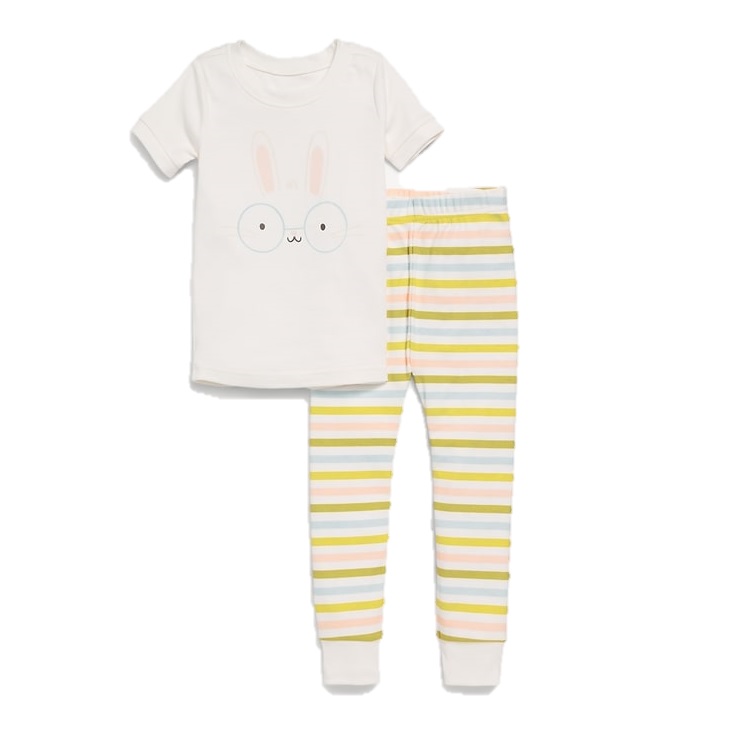 Children's pajama set featuring a white short-sleeve top with a cute bunny face design and multicolored striped pants.