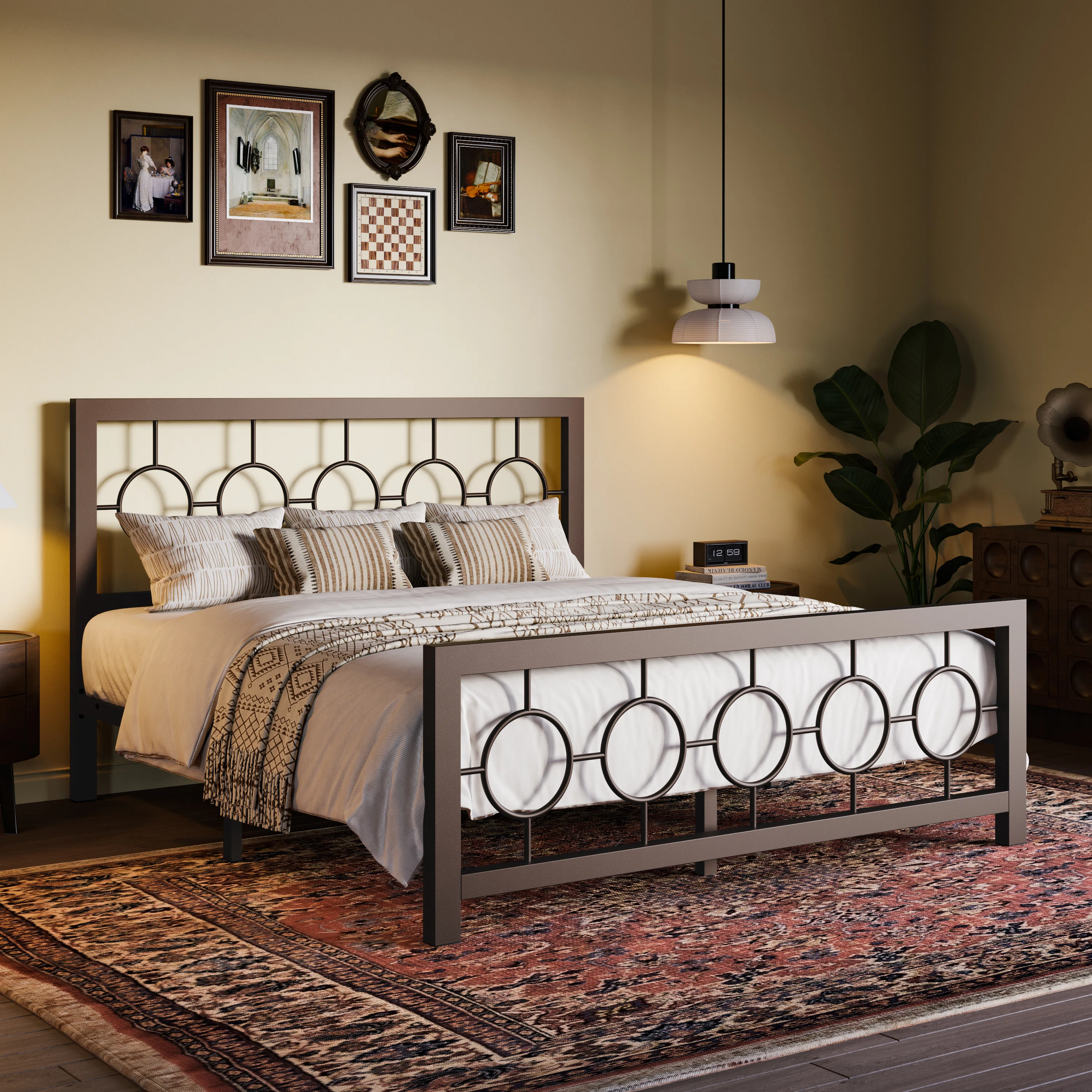 A bedroom setting with a metal framed bed, patterned bedding, and a large overhead pendant lamp.