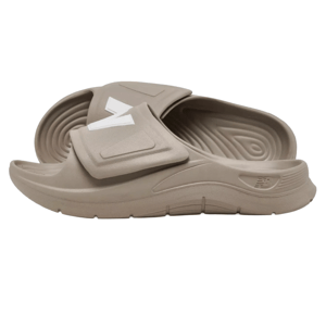 Beige slide sandals with a prominent white \“N\“ logo on the strap, featuring a textured footbed and grooved sole for comfort and grip.