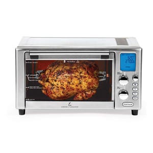 Emeril Lagasse Air Fryer Oven is a multifunctional countertop appliance with a digital display, control knobs, and rotisserie function, allowing for various cooking methods like air frying and roasting.