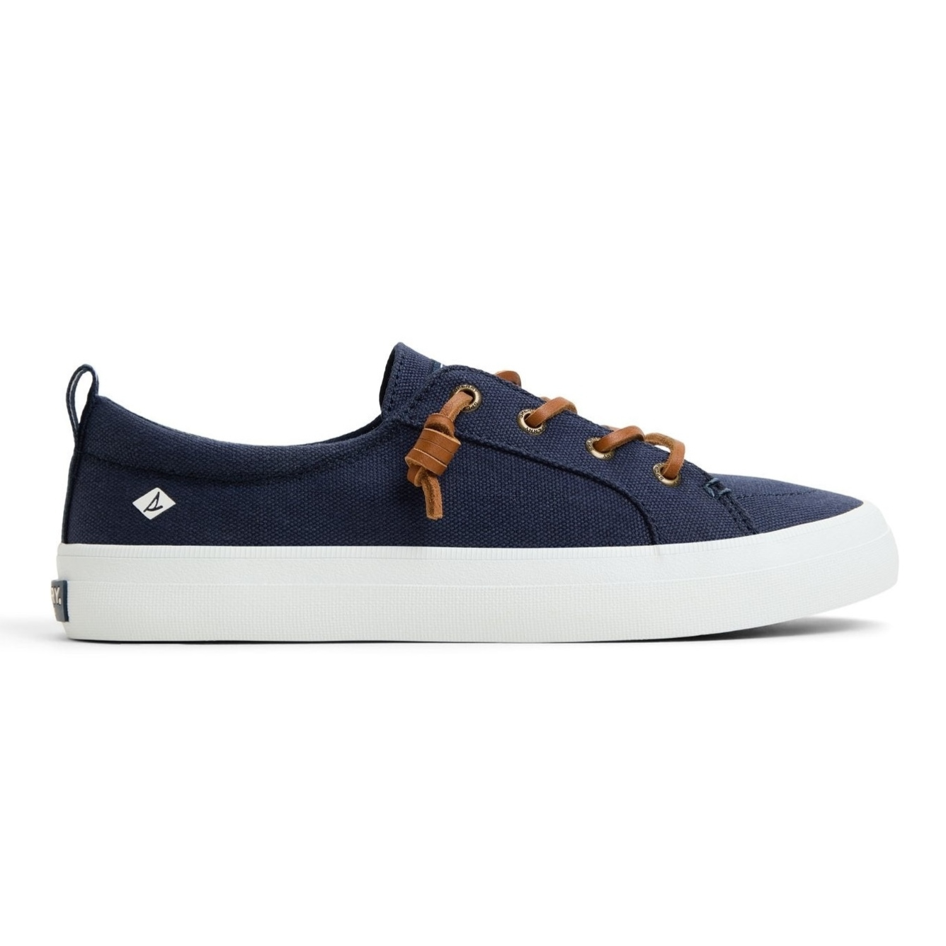 A navy canvas sneaker with white soles, featuring brown leather laces and a small logo on the side.