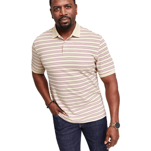 A men's Club Room polo shirt featuring beige and maroon stripes, short sleeves, and a classic collar, paired with dark jeans.