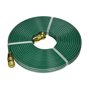 A coiled green garden hose with brass fittings.