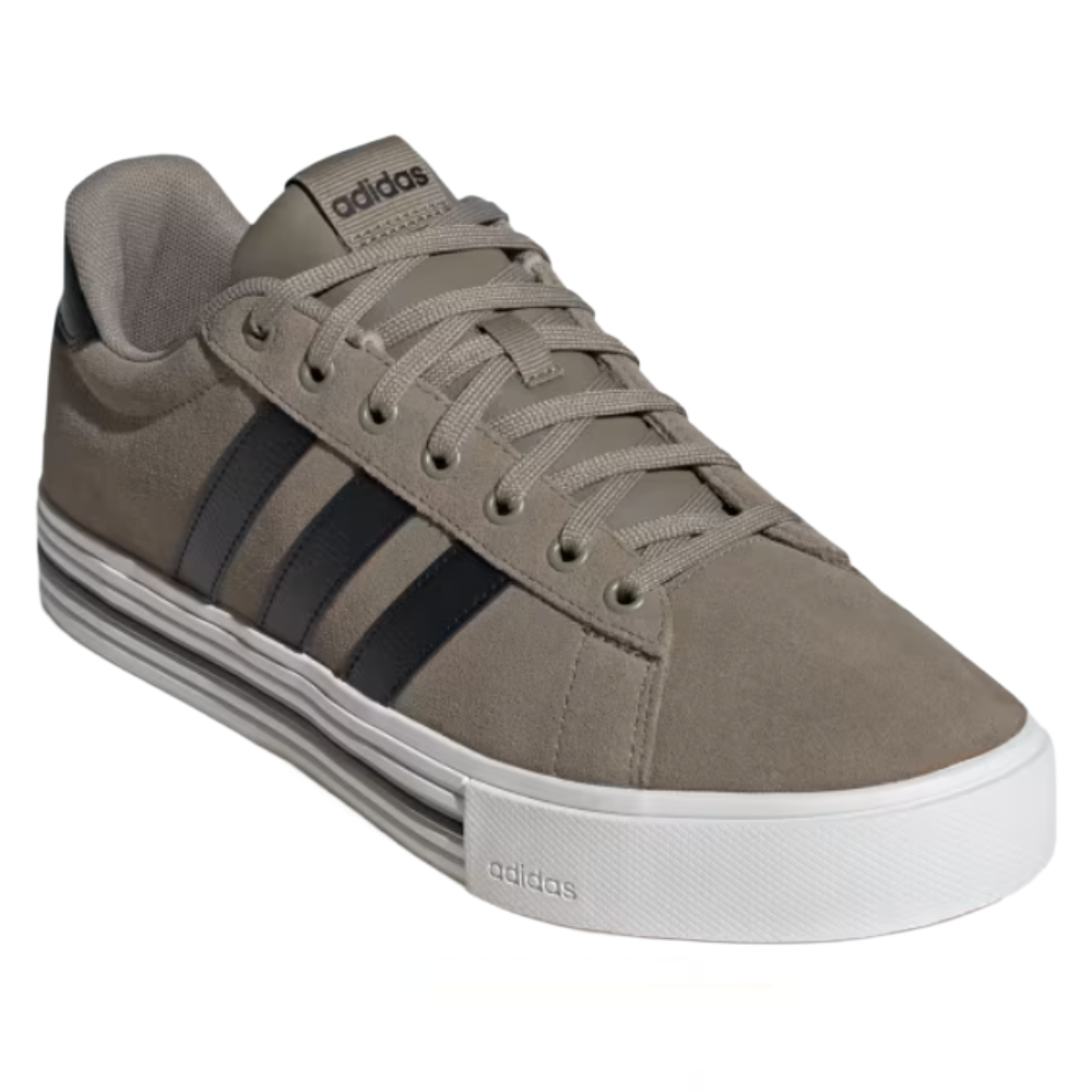 A taupe Adidas sneaker with a white sole, featuring black stripes and the Adidas logo on the tongue and side.