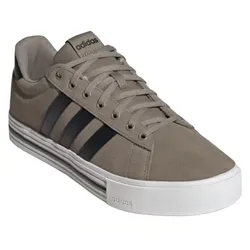 A taupe Adidas sneaker with a white sole, featuring black stripes and the Adidas logo on the tongue and side.