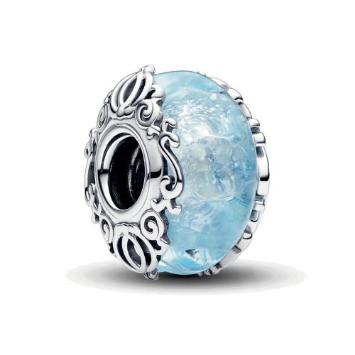 A decorative charm with a blue core encased in silver metal featuring intricate scrollwork designs.
