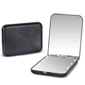A compact black handheld mirror with LED lights, featuring a folding design for portability.