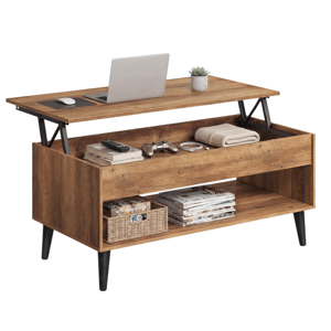 A wooden lift-top coffee table with black legs, featuring storage compartments beneath the top, holds items like a laptop, game controller, books, and a woven basket.