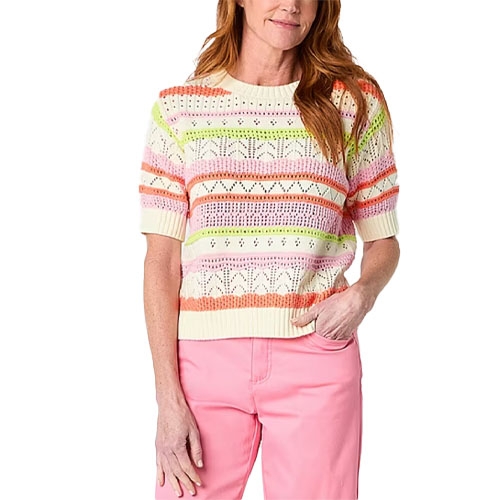 A St. John's Bay short sleeve sweater with a colorful striped pattern including pink, green, orange, and white, features a textured design and a ribbed hem worn with pink pants.
